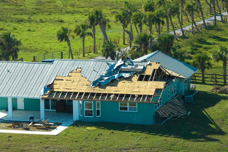 Hurricane damage to Houston residential roof showing importance of preparation